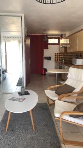 Appartements « Le Studio » central et lumineux : photos des chambres