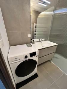 Appartements Refuge En Ville - Appart Cosy avec Garage : photos des chambres