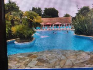 Maisons de vacances Bungalow de 2 chambres avec piscine partagee et terrasse amenagee a La Baule Escoublac : photos des chambres