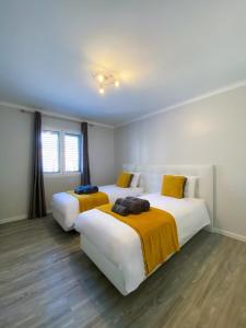 Village Square Coastal Apartment 2F