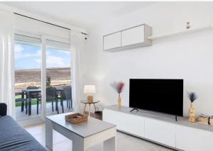 ATLANTERRA-ZAHARA DE LOS ATUNES Increíble apartamento con porche de 16m y jardín privado de 72m