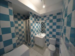 Appartements Sainte-Marine, Appartement cosy rez-de-jardin a 150m de la plage : photos des chambres