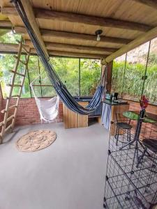 Suíte com Mezanino e Cachoeira no Quintal