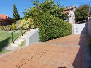 Villa Charneca, jardín y mar