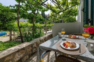 Studio-Apartment mit Gartenterrasse