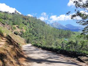 Attukad waterfalls near individual 4 Rooms cottage 4BHK attukad tea estate