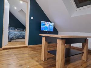 Appartements T2 / 24h du Mans / Circuit / Karting / Antares / Boulerie Jump / Stade de foot : photos des chambres