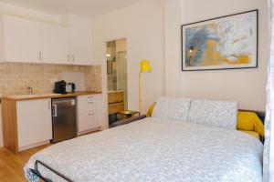 Appartements Appartement avec jardin : photos des chambres