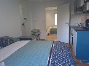 Appartements T2 Tom Krist. / Circuit 24h / Oasis /Antares : photos des chambres