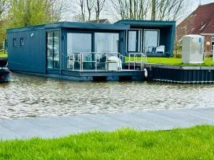 Uniek overnachten in een Tiny House op de Appelhof - Itens