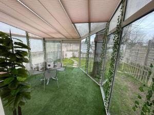 Appartements Appartement T3 avec jardin et veranda : photos des chambres