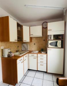 Appartements « La Cigale » : photos des chambres