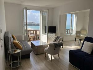 Appartements Les Pieds dans l'Eau : photos des chambres