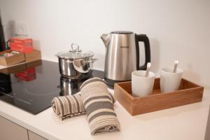 Stylish Grey Apartment - 5 minutes from the lake