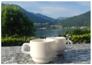 LF_SUITE_ Lugano Lake_ Ampia Terrazza ; Spiaggia privata_ WI-FI_ Netflix_