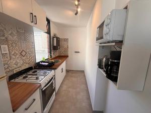 Hermoso departamento 2 dormitorios con cochera