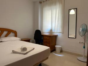 Garden Teatinos, apartamento con piscina, aparcamiento y AC