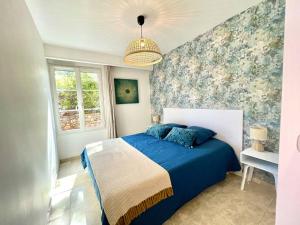 Appartements Appartement de standing avec jardin : photos des chambres