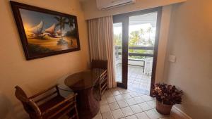 Um paraíso ao seu alcance! Apartamento na praia