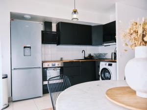 Appartements Bel appart familial avec terrasse aux portes de Paris - Parking gratuit : photos des chambres