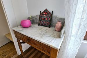 Appartements Lilas Rose : photos des chambres
