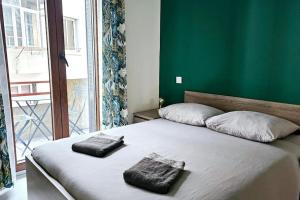 Appartements Lilas Rose : photos des chambres
