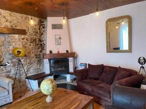 Maisons de vacances Maison chaleureuse et rustique : photos des chambres