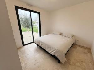 Maisons de vacances L-emeraude - Avec jardin : photos des chambres