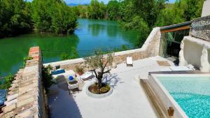 Maisons d'hotes Les Terrasses de Belarga - Maison d-hotes - Piscine et Jacuzzi : photos des chambres