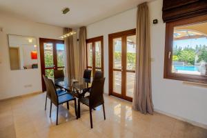 Luxury Elite Villa AJ04 complete with a private, climate controlled pool and a relaxing outdoor Jacuzzi, Aphrodite Hills Resort