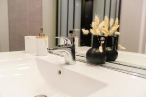 Appartements Les Salins * Appartement * Clim * Wifi * Commerces : photos des chambres