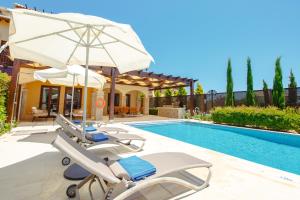 Luxury Elite Villa AJ06 complete with a private, climate controlled pool and a relaxing outdoor Jacuzzi, Aphrodite Hills Resort