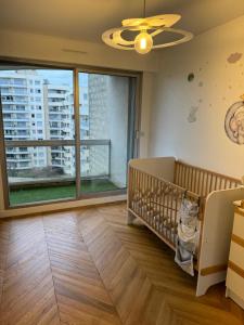 Appartements Appartement cosy vu Tour Eiffel : photos des chambres