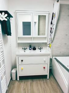 Appartements Logement Magique a 1,5 km de Disneyland Paris : photos des chambres