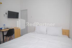 River House Mitra RedDoorz