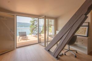 Villas Villa 83 Bis Veyrier du lac villa mitoyenne pieds dans l-eau avec piscine : photos des chambres