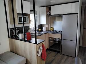 Campings Mobil-home - Clim, TV, LL - Camping LE LAC DES REVES 4 etoiles - MH-A020 : photos des chambres