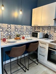 Appartements ClassicBlue, centre de Mulhouse : photos des chambres
