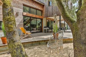 Maisons de vacances Les Pins - Maison avec piscine & jacuzzi : photos des chambres