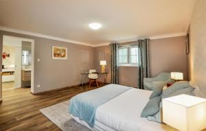 Maisons de vacances 2 Bedroom Cozy Home In Tabre : photos des chambres