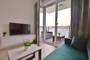 Apartamenty Bryza - Zielona Ostoja - garaż - komórka