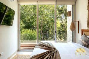 NHOA 206A Lux 2BR Condo Jungle View in Aldea Zama