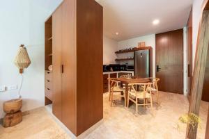 NHOA 206B Lux 1BR Condo Jungle View in Aldea Zama