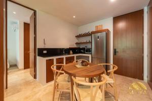 NHOA 206B Lux 1BR Condo Jungle View in Aldea Zama