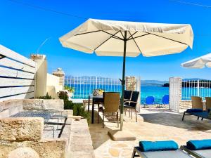 Beachfront House Christina with private heatable pool by DadoVillas