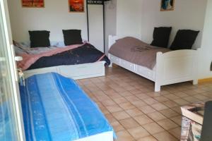 Appartements studio rez-de-chaussee jusqu'a 4 personnes : photos des chambres