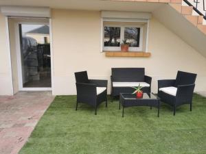 Appartements studio rez-de-chaussee jusqu'a 4 personnes : photos des chambres