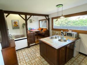 Appartements Le Bacchus : photos des chambres