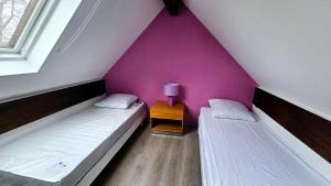 Appartements Le Bacchus : photos des chambres