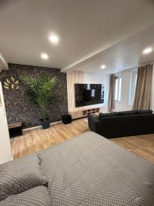 Appartements Appartement tout confort : photos des chambres
